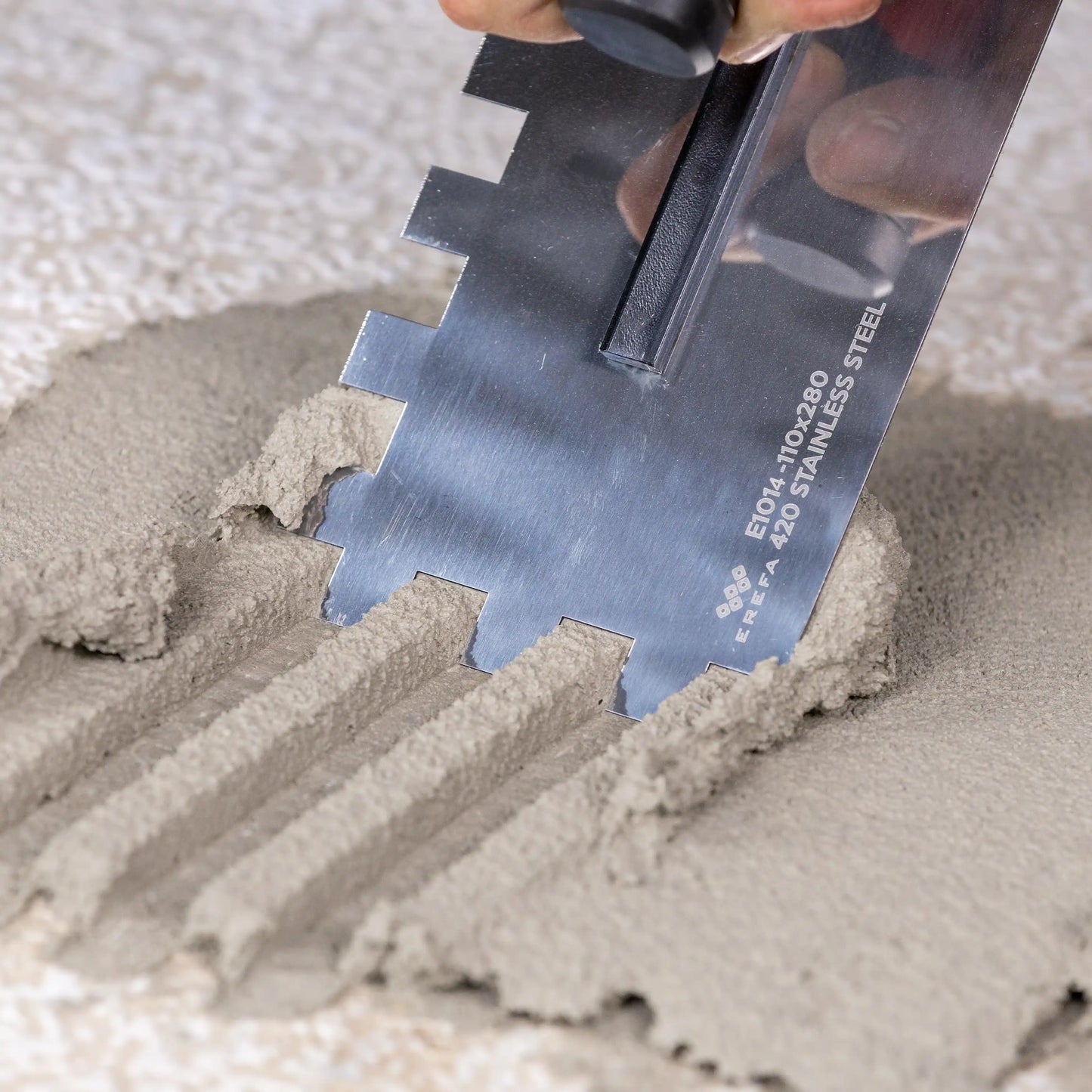 E1013 Edelstahlkelle mit 12 mm Abstand