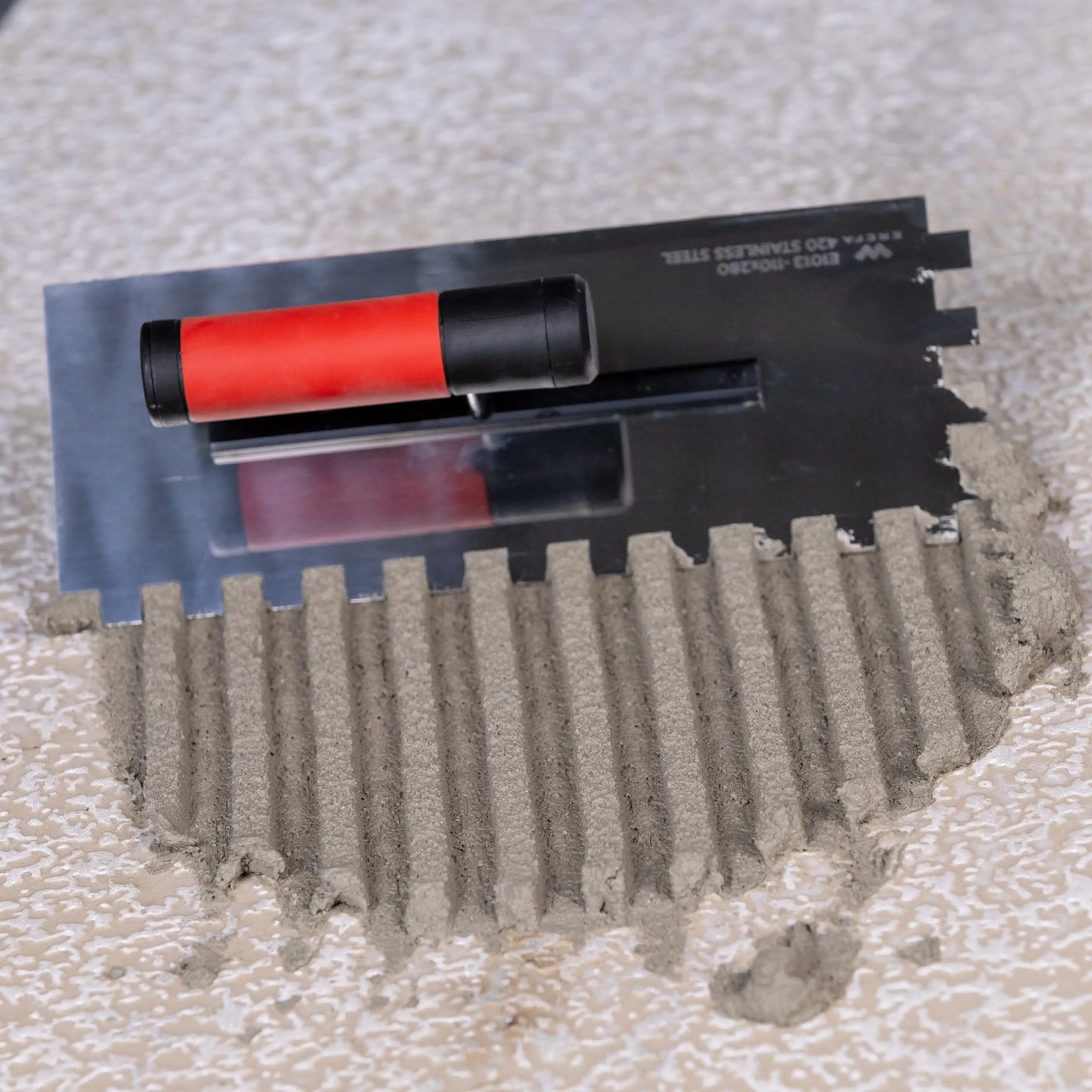 E1012 Edelstahlkelle mit 10 mm Abstand