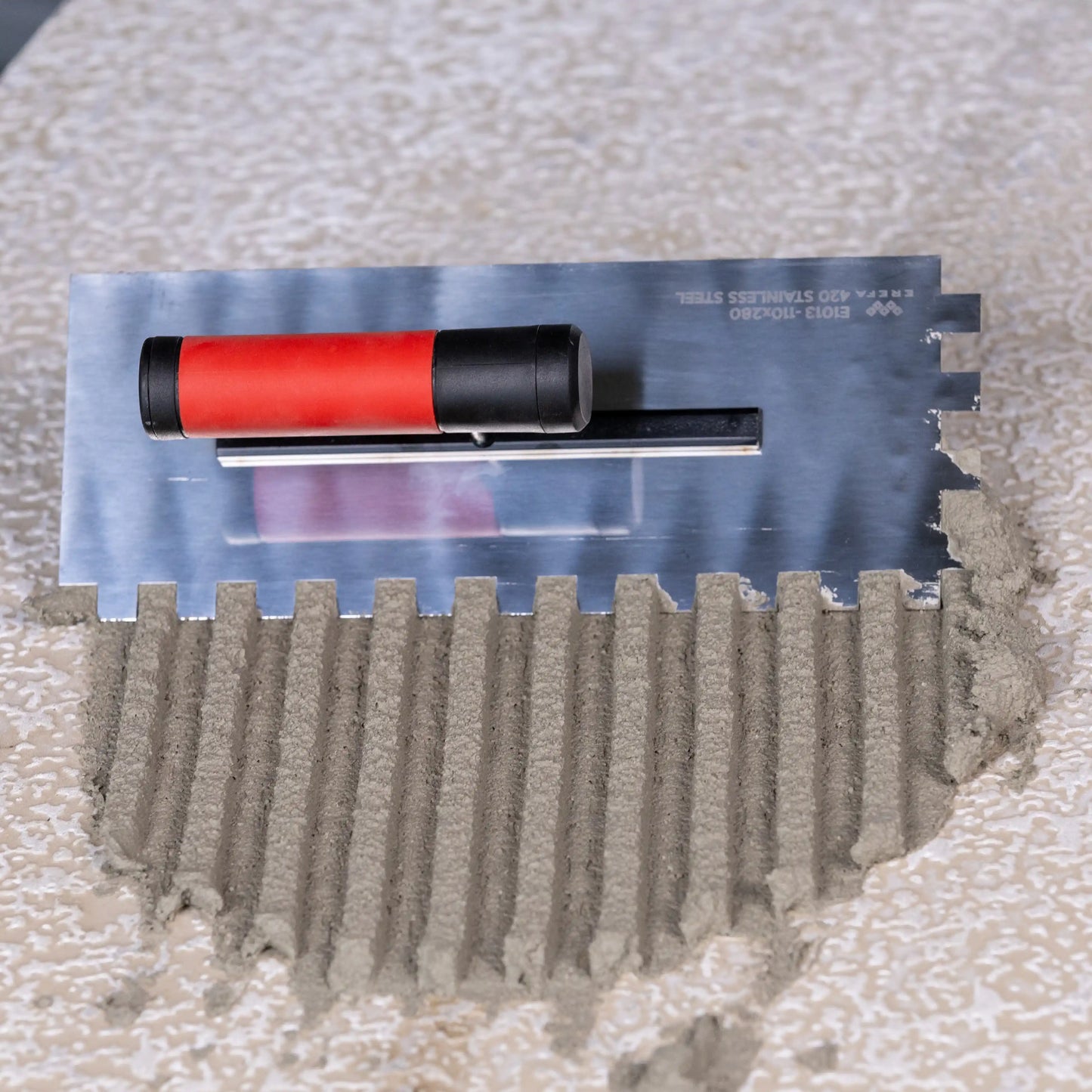 E1012 Edelstahlkelle mit 10 mm Abstand